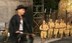 汉奸在前面骑自行车日本兵在后面跑